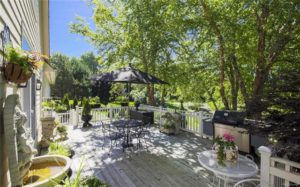 The beautiful porch and spacious backyard