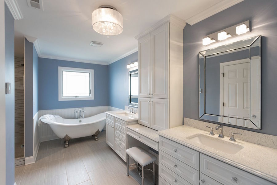 A spa-like master bathroom with clawfoot tub.