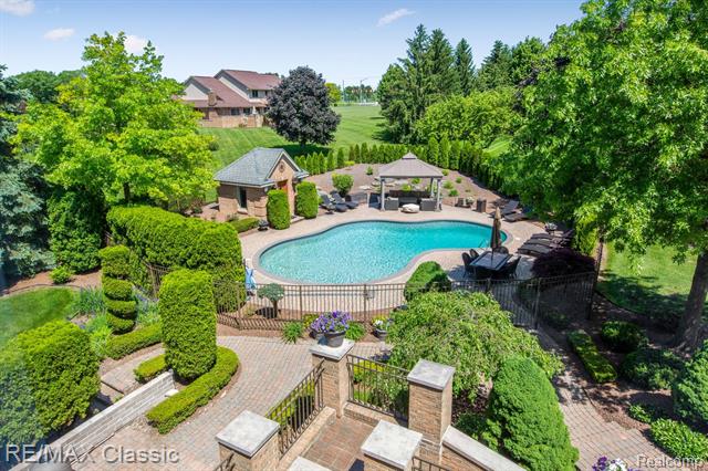 The sparkling pool at 13055 Mystic Forest Drive.